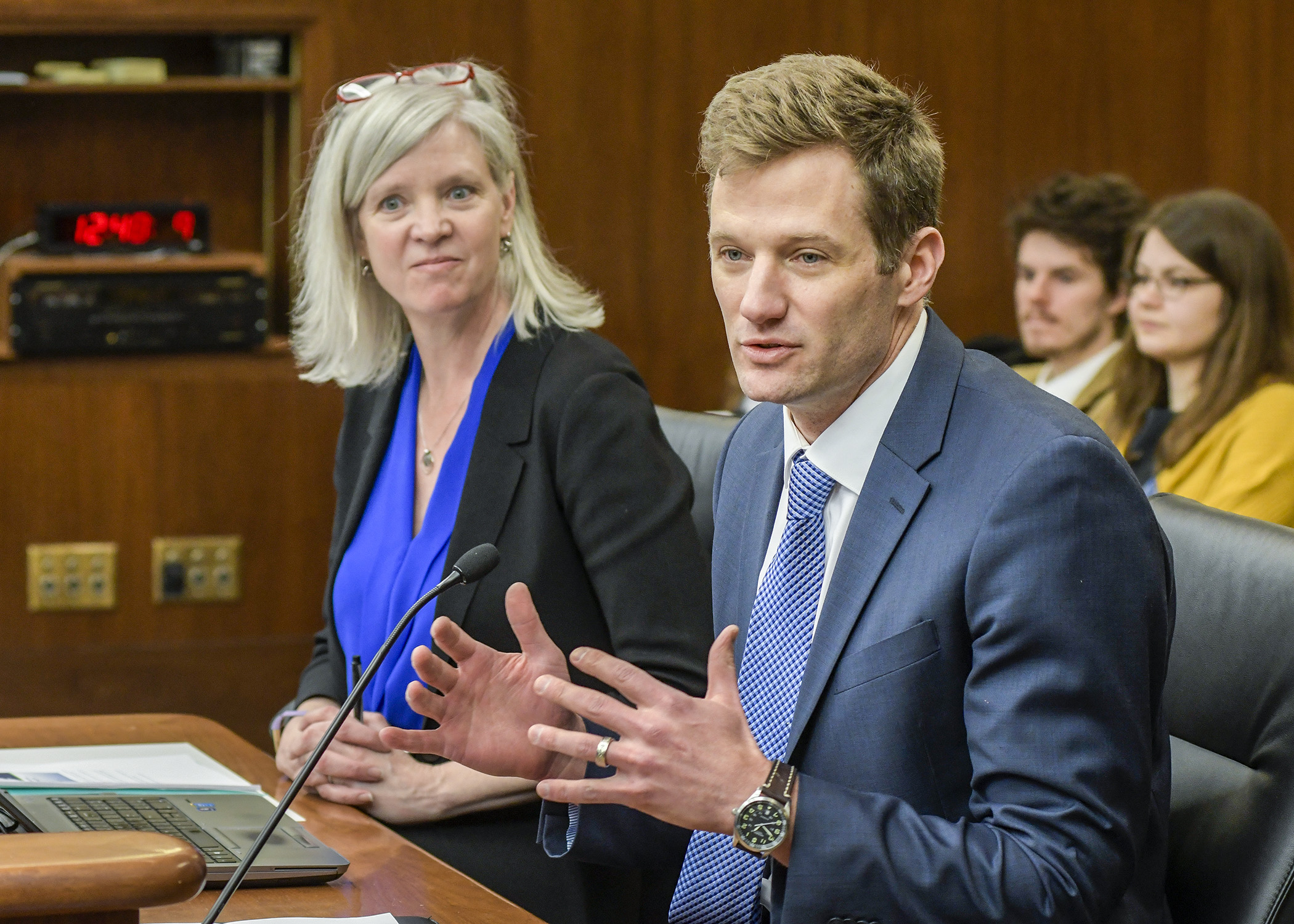 DEED Commissioner Steve Grove and Danna Mackenzie, executive director for the Office of Broadband Development, testify before the House Greater Minnesota Jobs and Economic Development Finance Division Feb. 20. Photo by Andrew VonBank